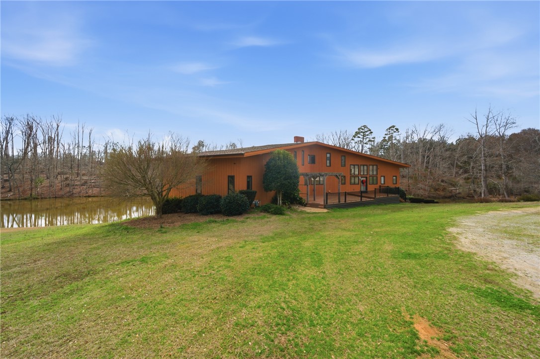1531 Highway 252 Laurens, SC 29360 - Photo 32 of 40 This tranquil property boasts a unique home with a private pond and natural surroundings.