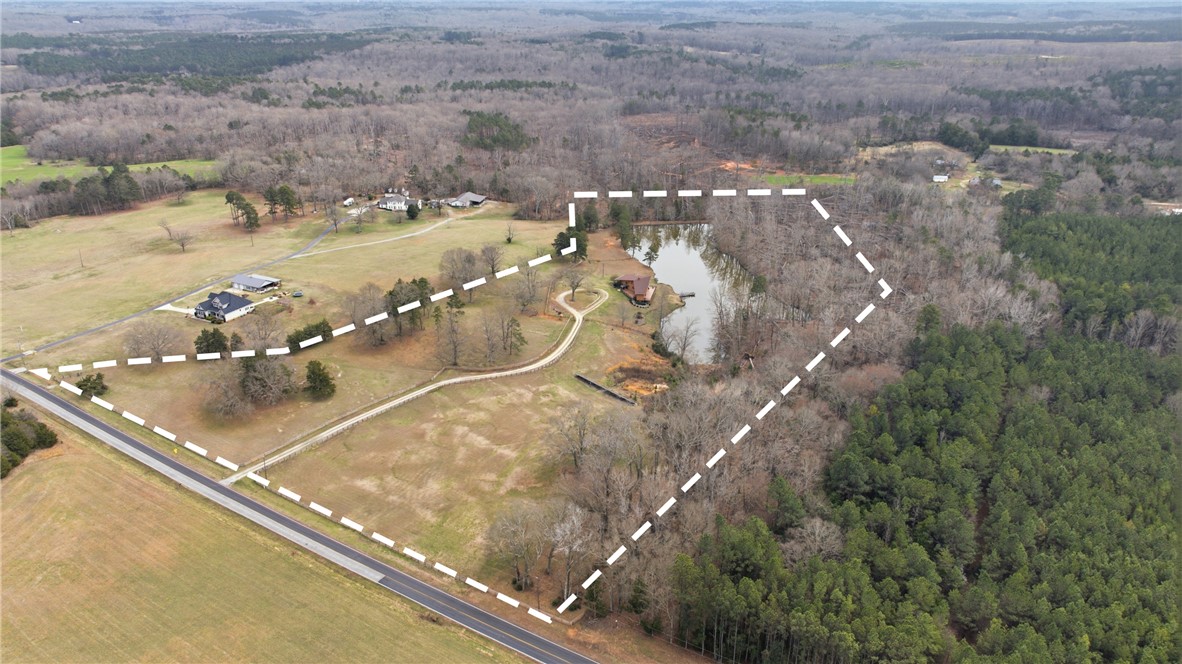 1531 Highway 252 Laurens, SC 29360 - Photo 35 of 40 Expansive acreage with a serene lake and established homes, offering vast potential for development or private retreat.