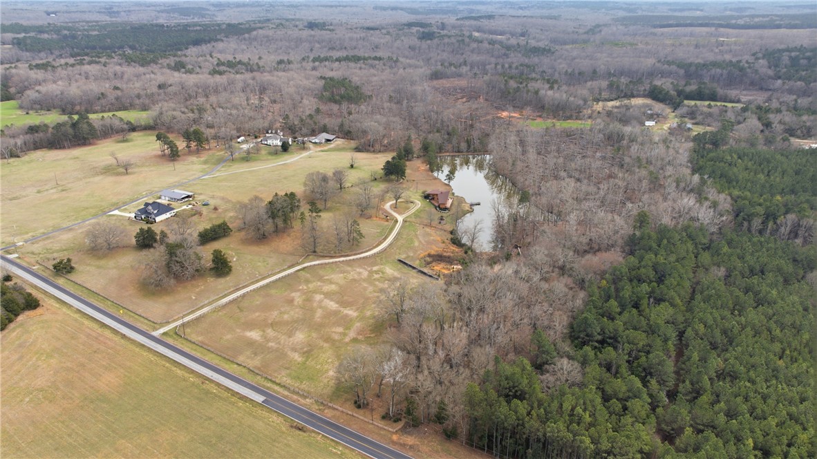 1531 Highway 252 Laurens, SC 29360 - Photo 36 of 40 This sprawling landscape offers tranquil living with vast woodlands and a private lake.