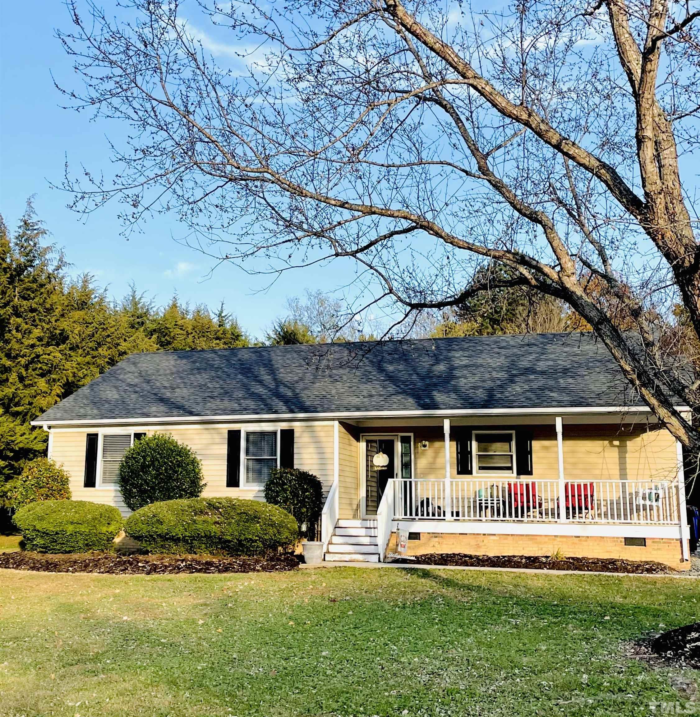 6908 Kiger Road Rougemont, NC 27572 - Photo 1 of 30 a front view of a house with a yard