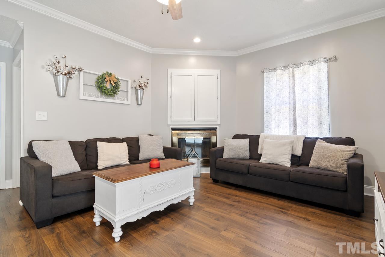 6908 Kiger Road Rougemont, NC 27572 - Photo 17 of 30 a living room with furniture and a large window