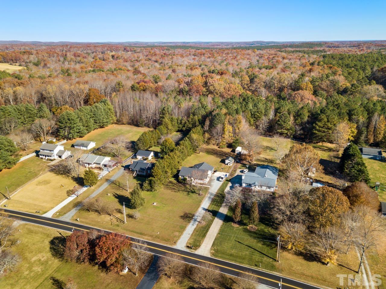 6908 Kiger Road Rougemont, NC 27572 - Photo 30 of 30 an aerial view of residential houses with outdoor space