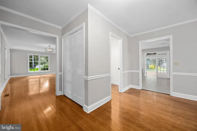 a bathroom with a double vanity sink a mirror and shower
