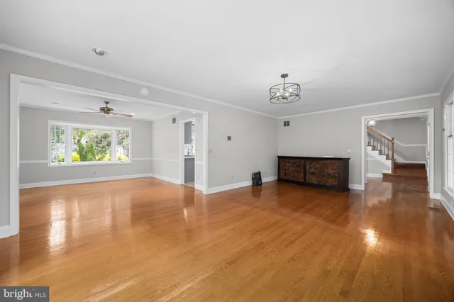 a bathroom with a double vanity sink a mirror and a shower