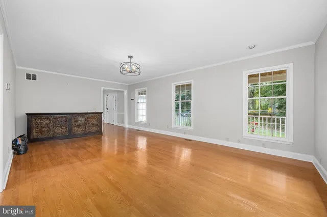 a bathroom with a double vanity sink a mirror and a shower