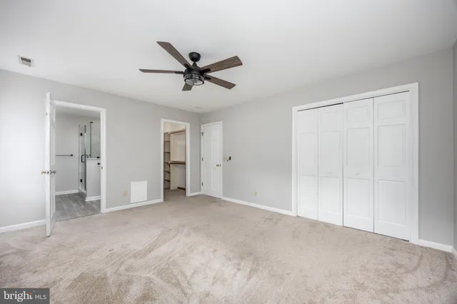 a view of a swimming pool with an outdoor space and seating area