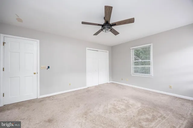a view of a backyard with sitting area and slide