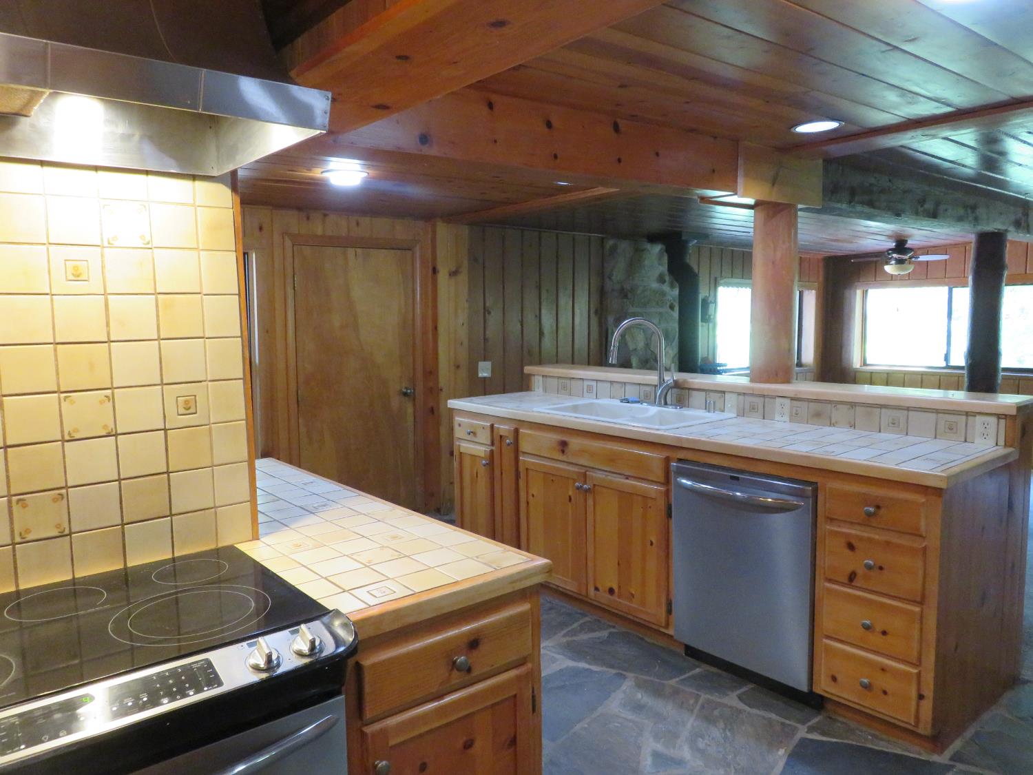 2563 Woodhouse Mine Road West Point, CA 95255 - Photo 32 of 49 a kitchen with a sink and cabinets