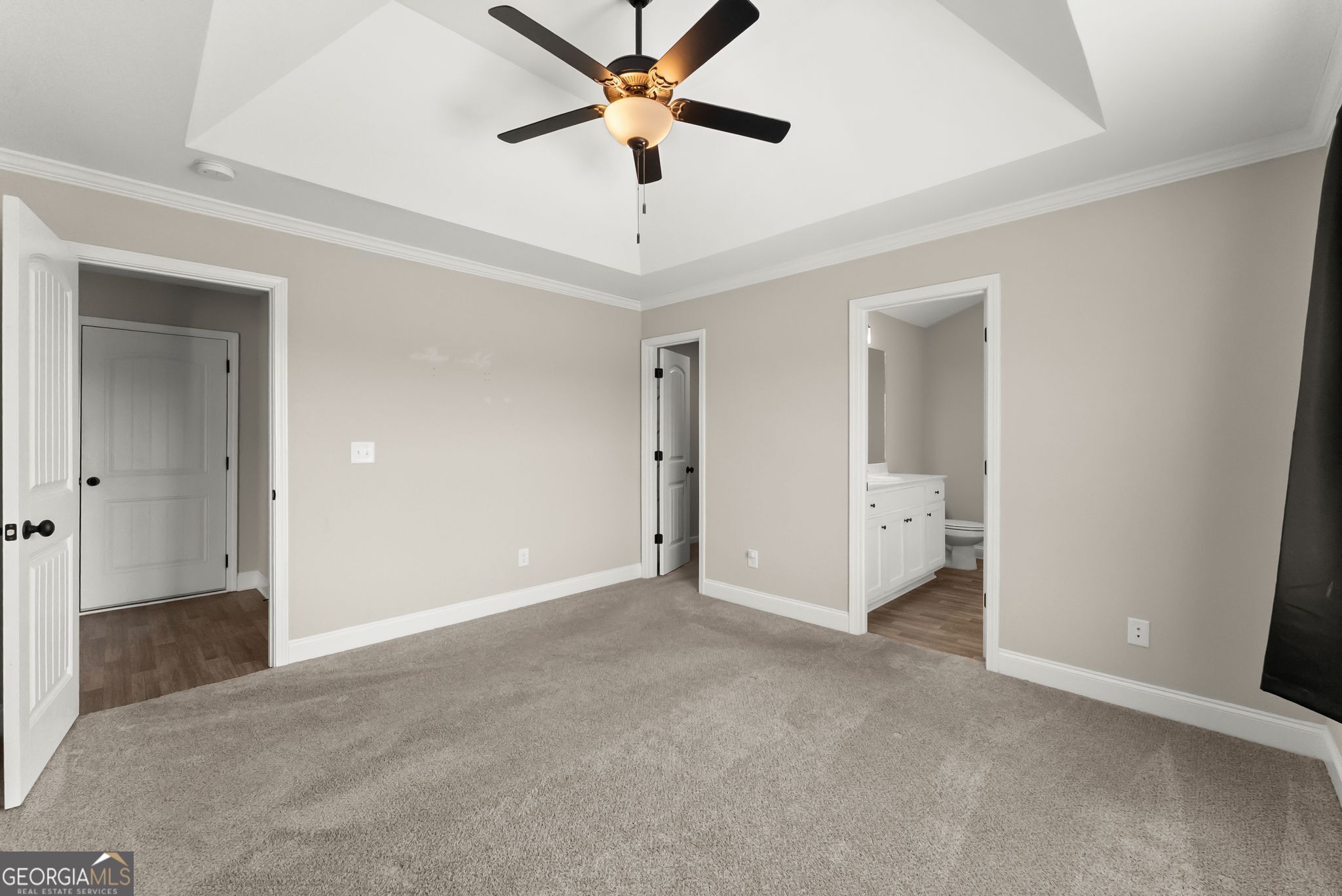 810 Anderson Thomas Road Martin, GA 30557 - Photo 23 of 40 a view of a room with a ceiling fan and carpet