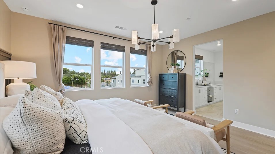 1025 Citron Road Fullerton, CA 92833 - Photo 11 of 25 a bedroom with a bed chandelier and a window