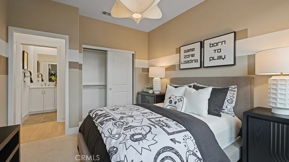 1025 Citron Road Fullerton, CA 92833 - Photo 15 of 25 a bedroom with a bed and a lamp