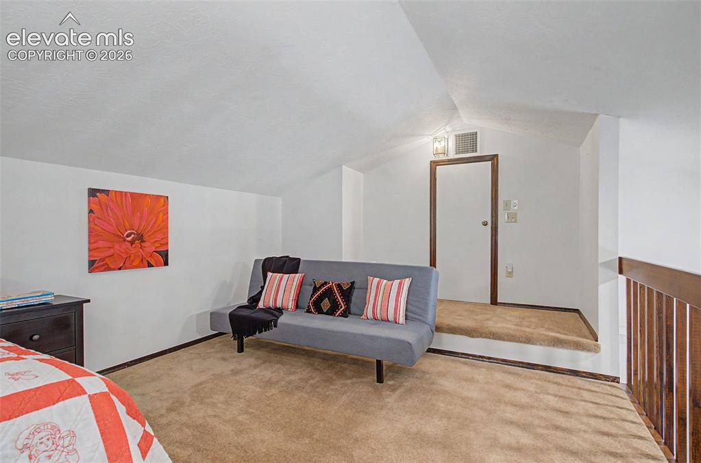 8020 Westwood Road Colorado Springs, CO 80919 - Photo 28 of 50 Another view of the loft! Plenty of room for an extra bed or maybe a library and a reading nook.