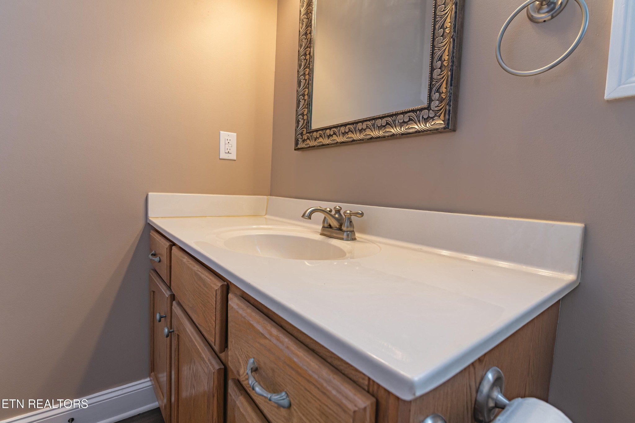 8007 Tazewell Pike Corryton, TN 37721 - Photo 16 of 43 a bathroom with a sink and a mirror