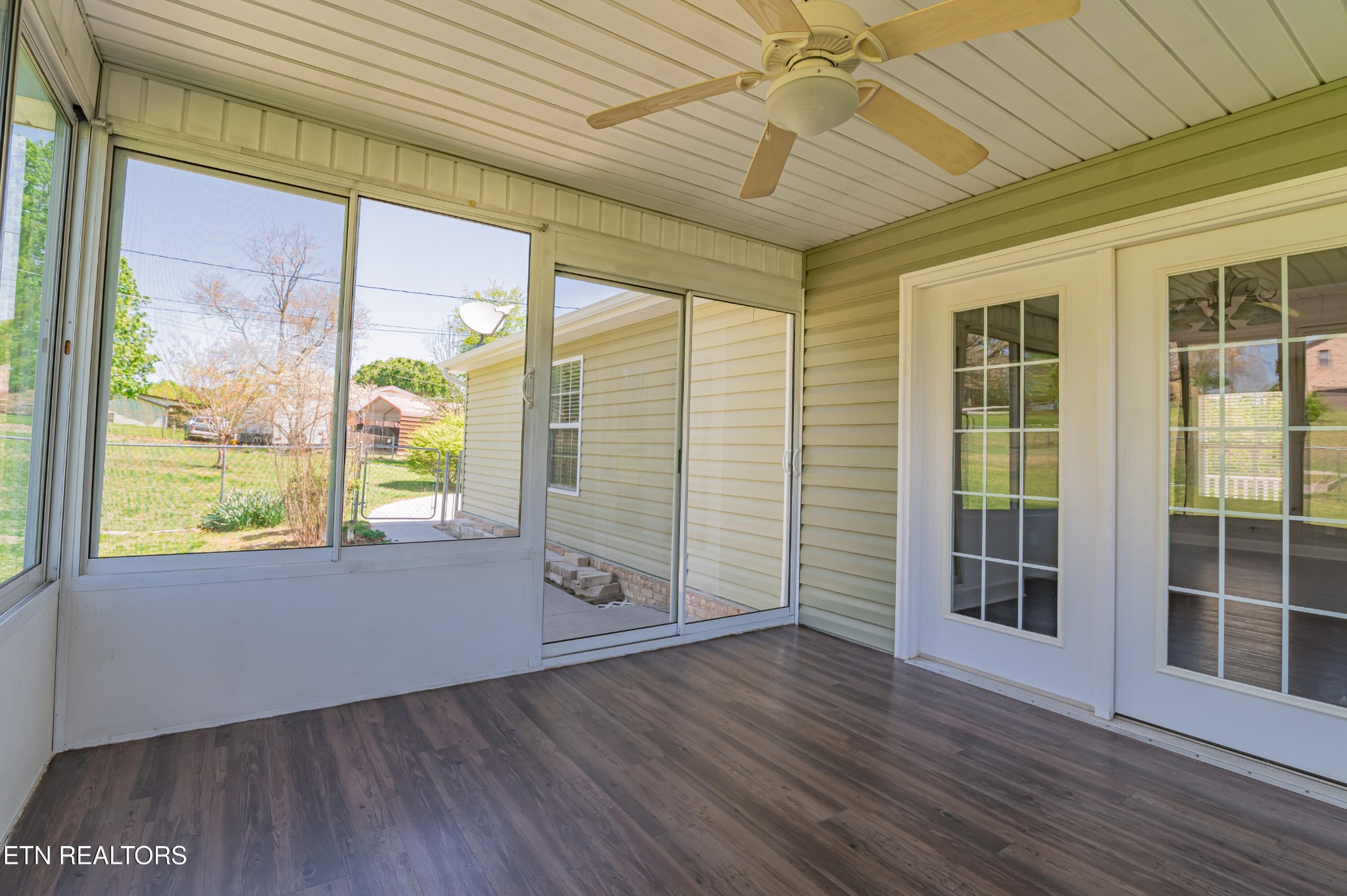 8007 Tazewell Pike Corryton, TN 37721 - Photo 28 of 43 an empty room with wooden floor and windows