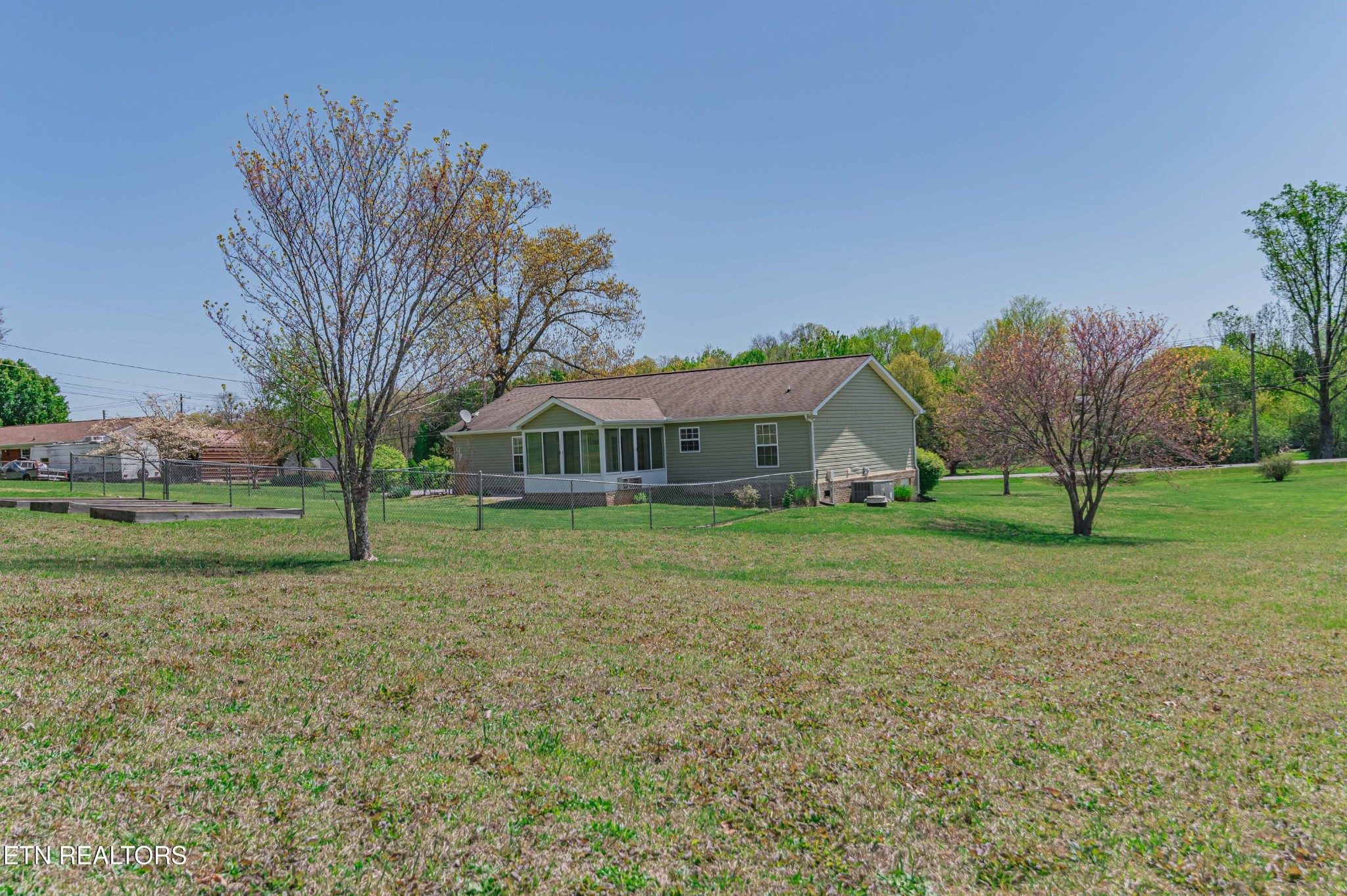 8007 Tazewell Pike Corryton, TN 37721 - Photo 35 of 43 a front view of a house with a yard