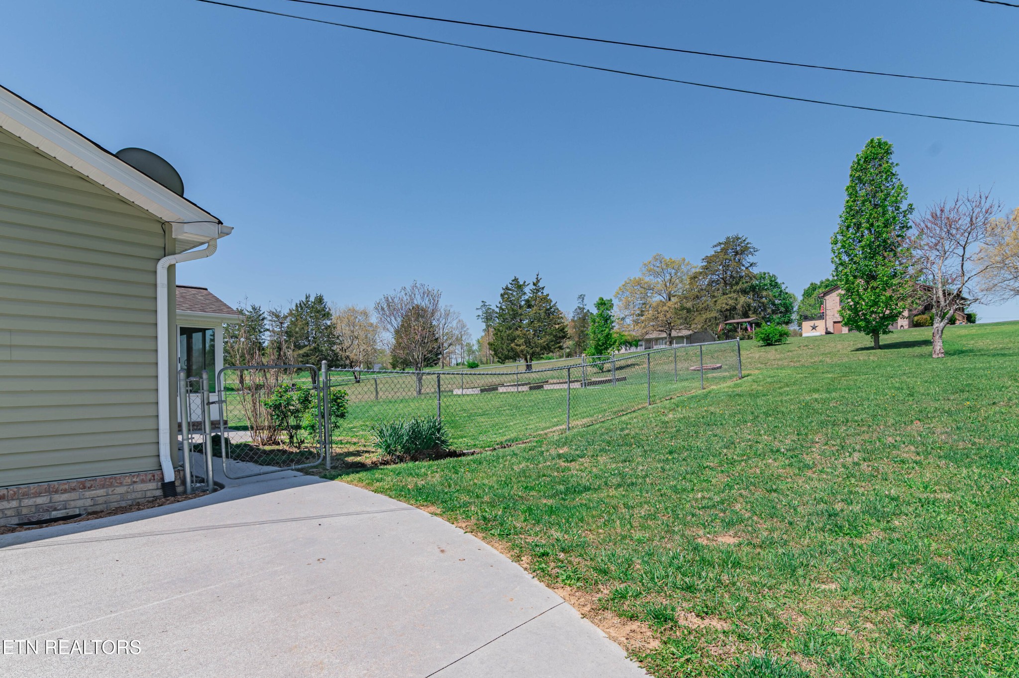 8007 Tazewell Pike Corryton, TN 37721 - Photo 36 of 43 a backyard of a house with lots of green space