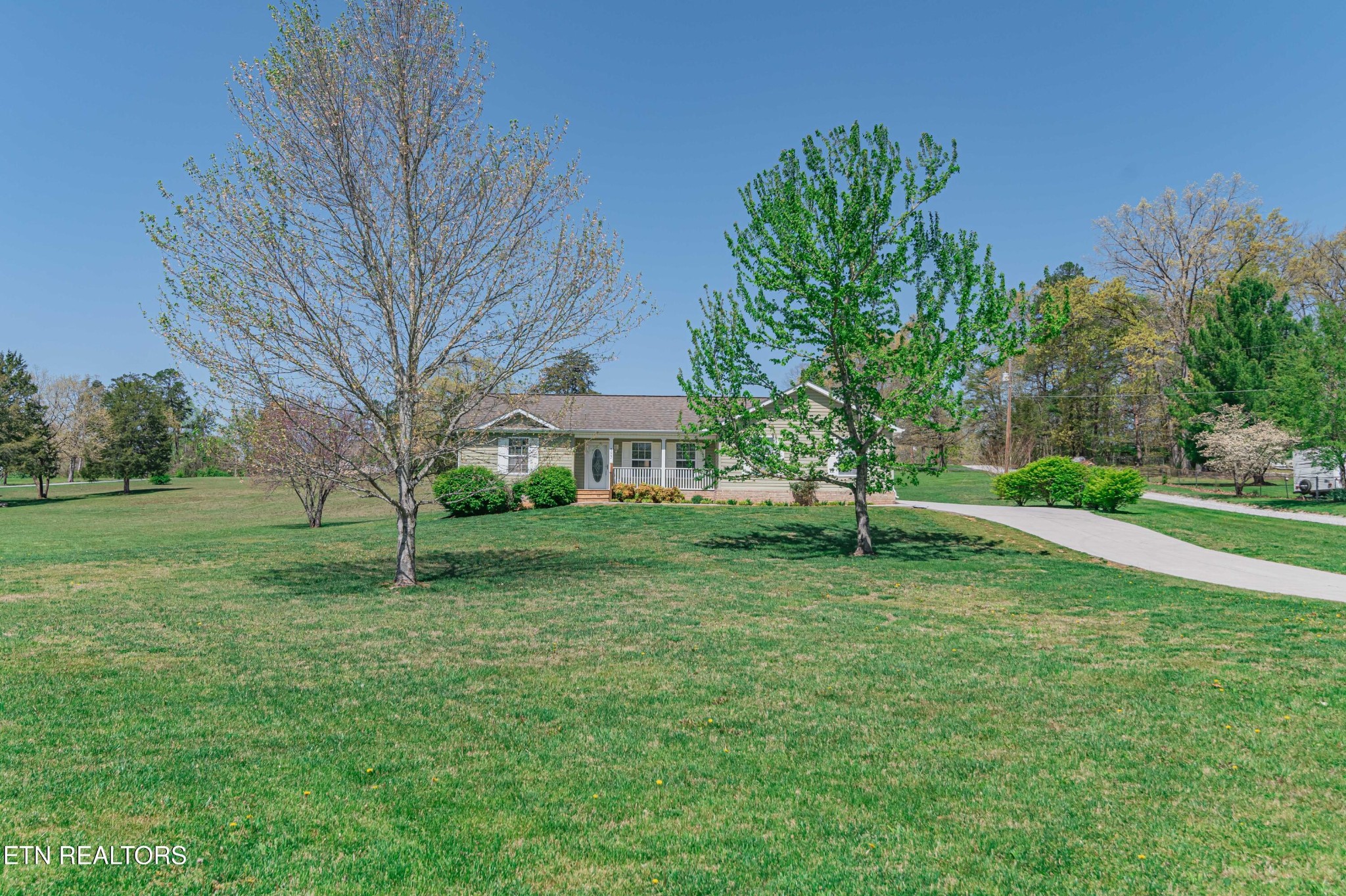 8007 Tazewell Pike Corryton, TN 37721 - Photo 40 of 43 a view of a house with a yard