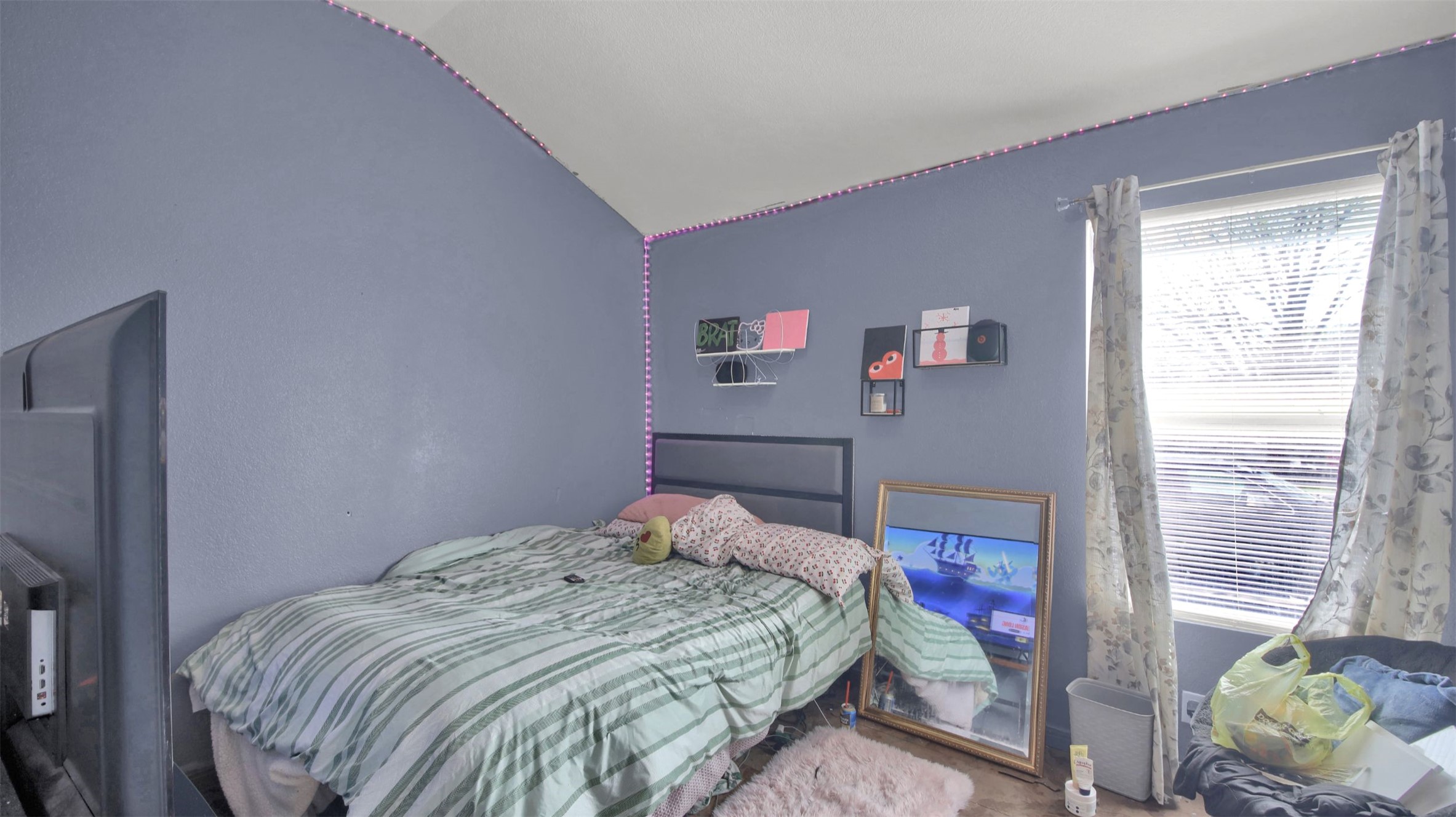 9609 Magna Carta Loop Austin, TX 78754 - Photo 21 of 30 a bedroom with a bed and a window