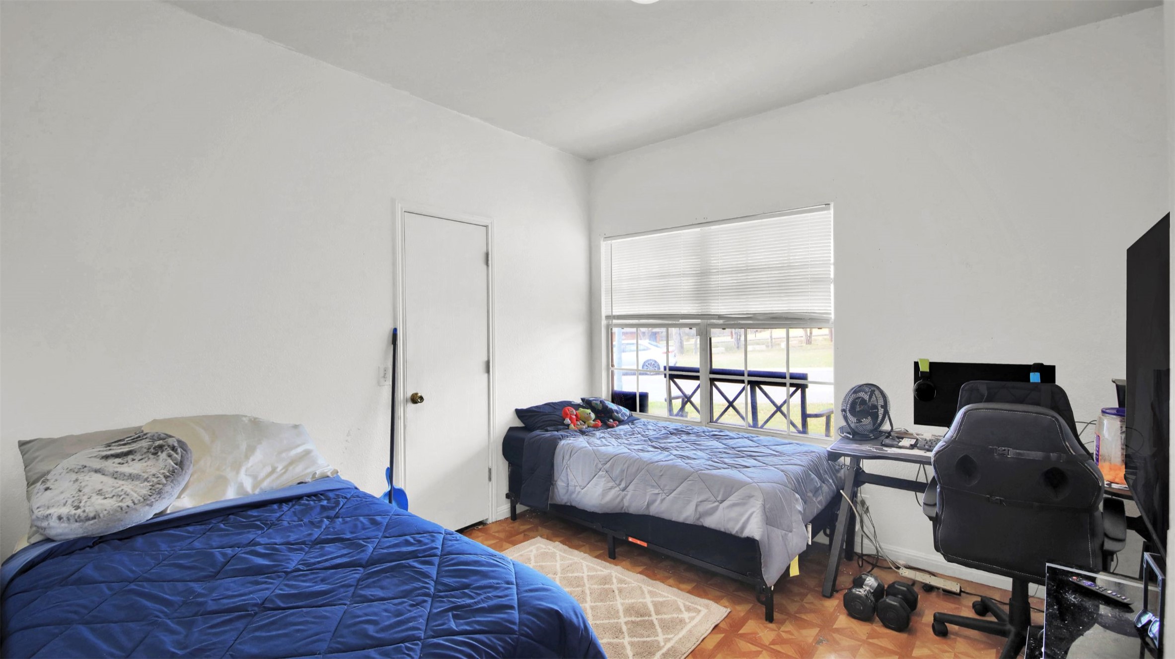 9609 Magna Carta Loop Austin, TX 78754 - Photo 23 of 30 a bedroom with a bed and window