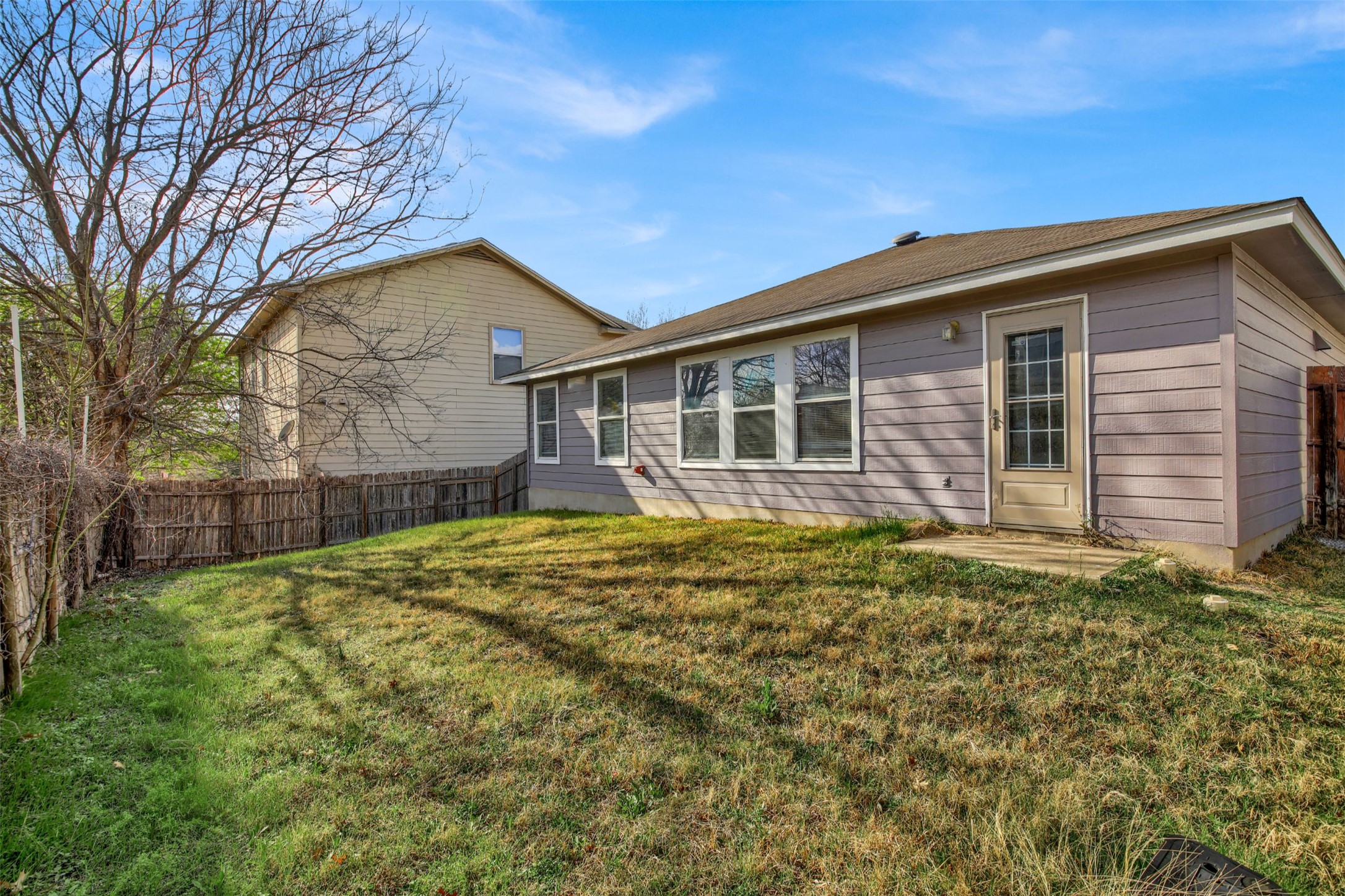 9609 Magna Carta Loop Austin, TX 78754 - Photo 25 of 30 a front view of a house with a yard