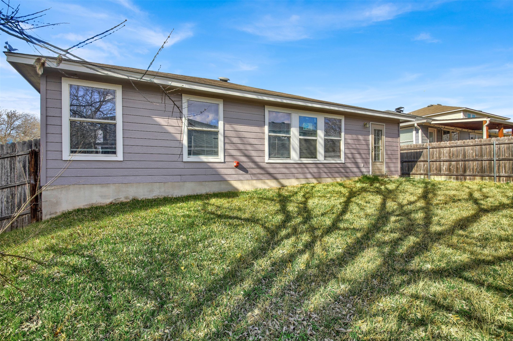 9609 Magna Carta Loop Austin, TX 78754 - Photo 26 of 30 a brick house with a large windows