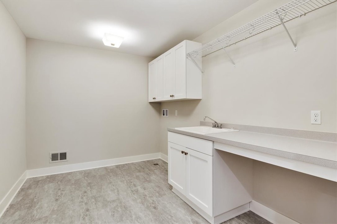 57 Coventry Ridge Pittsford, NY 14534 - Photo 23 of 37 2nd floor laundry room