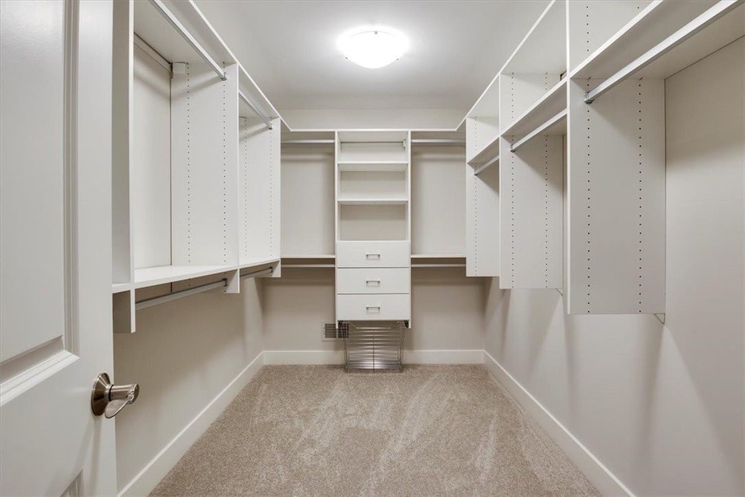 57 Coventry Ridge Pittsford, NY 14534 - Photo 28 of 37 One primary WIC with California closet systems