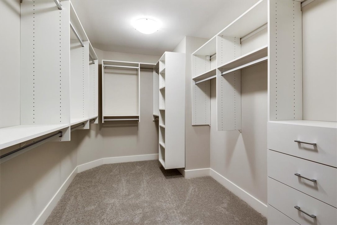 57 Coventry Ridge Pittsford, NY 14534 - Photo 29 of 37 One primary WIC with California closet systems