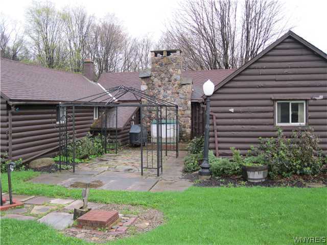 8867 Feddick Road Boston, NY 14075 - Photo 1 of 1 Exterior Front Back house (log house)