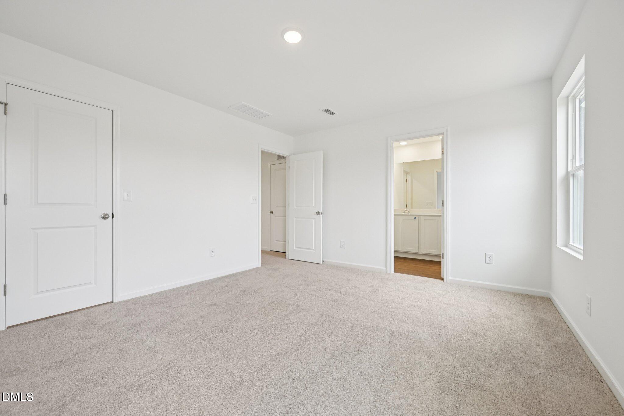 1610 Mirth Court Rolesville, NC 27571 - Photo 25 of 36 a view of an empty room with a window