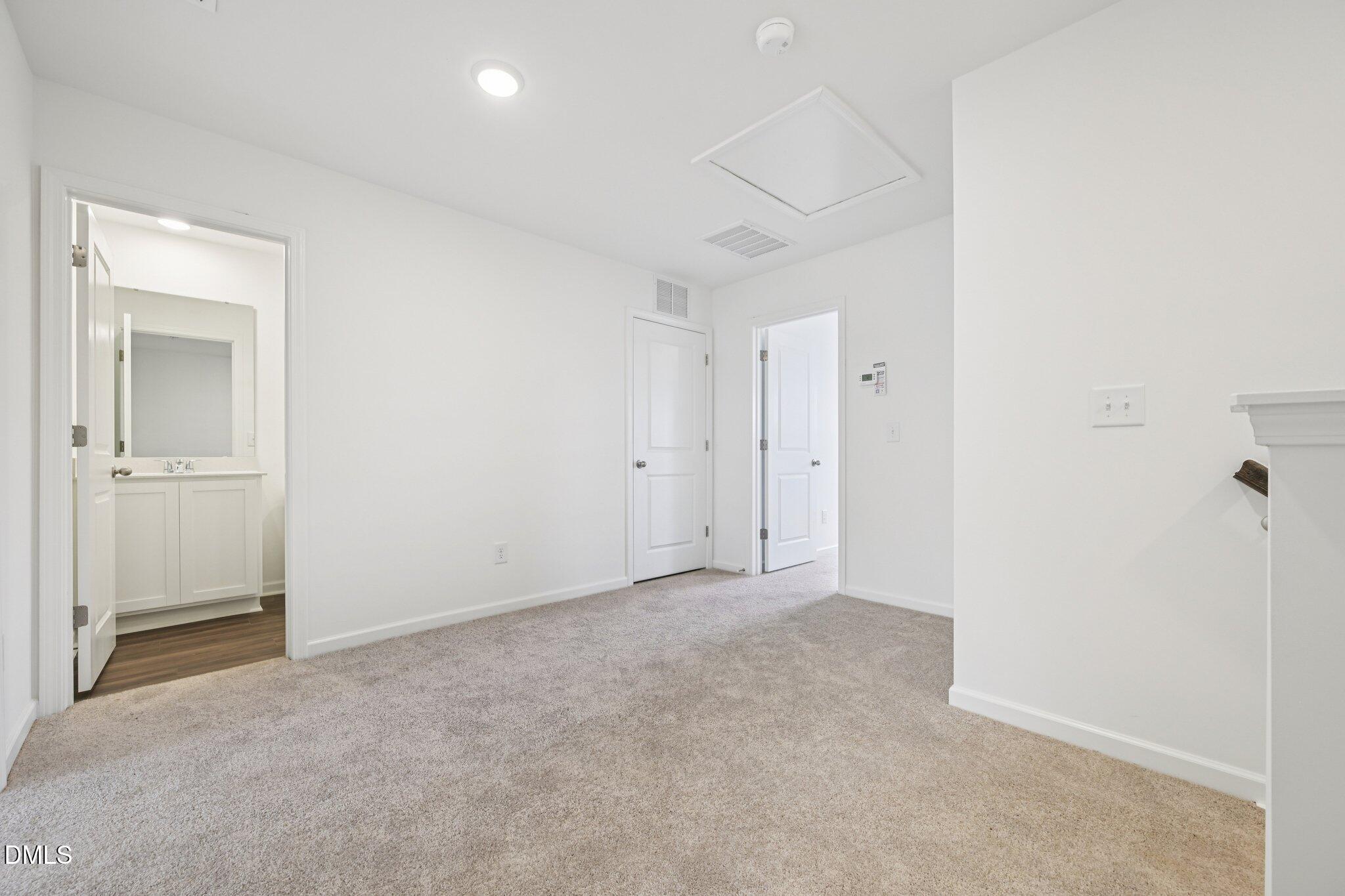 1610 Mirth Court Rolesville, NC 27571 - Photo 29 of 36 an empty room with closet area