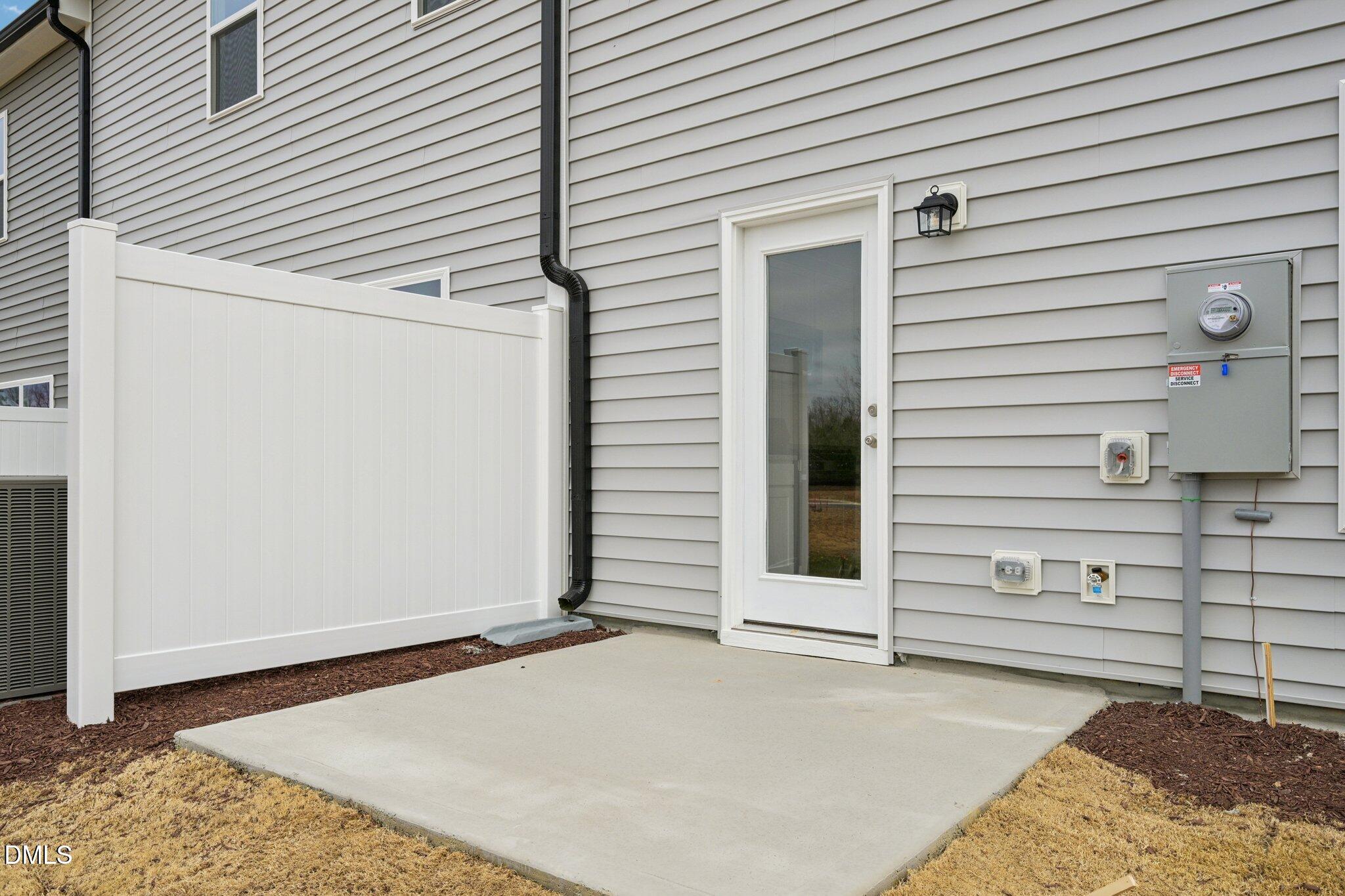 1610 Mirth Court Rolesville, NC 27571 - Photo 30 of 36 a view of a house with a door and wooden roof