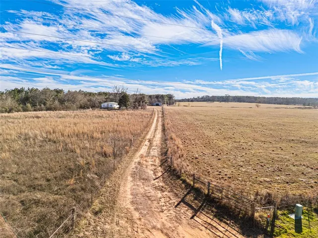 a view of road with yard