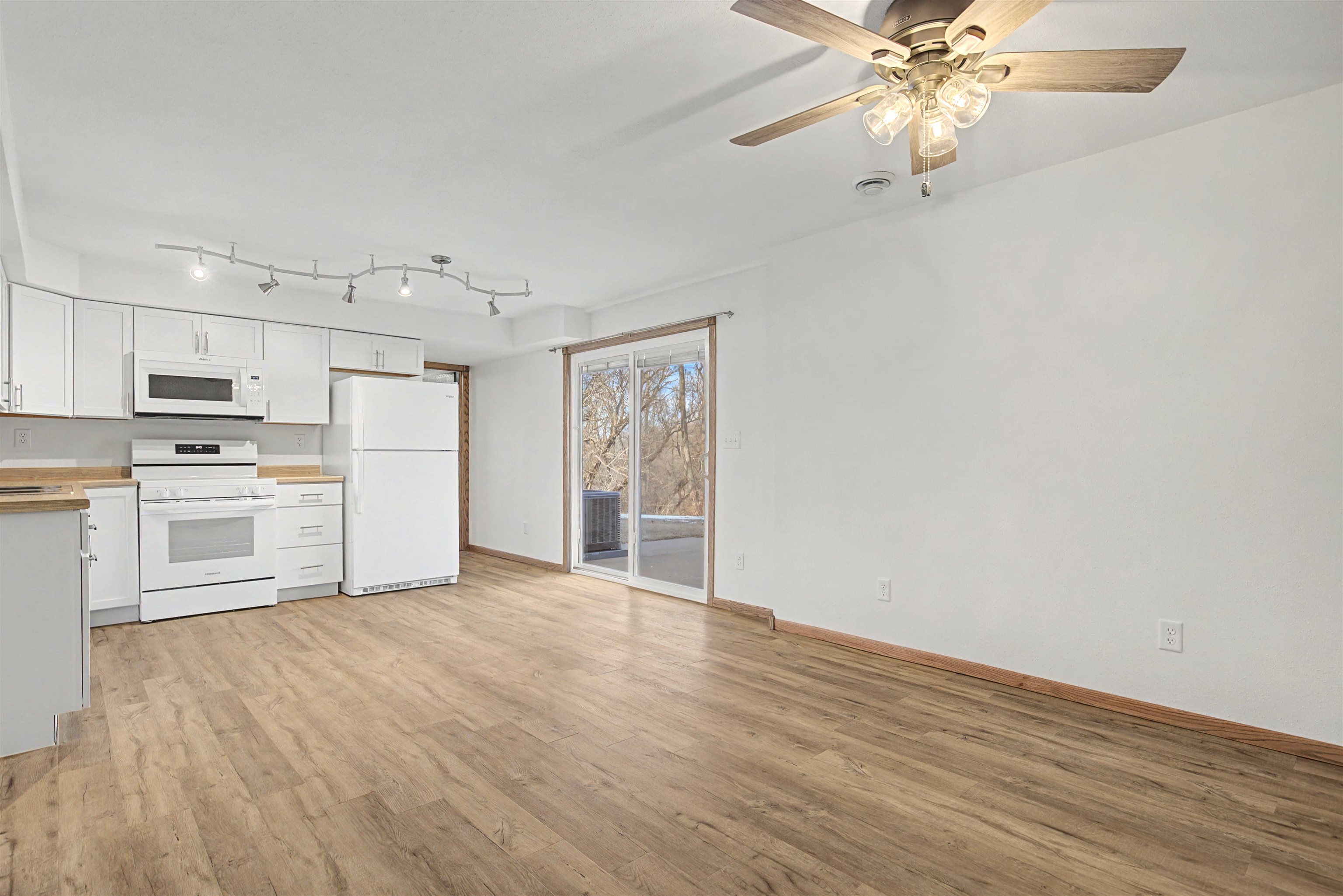 325 Apache Court Galena, IL 61036 - Photo 20 of 43 a view of an empty room with a kitchen