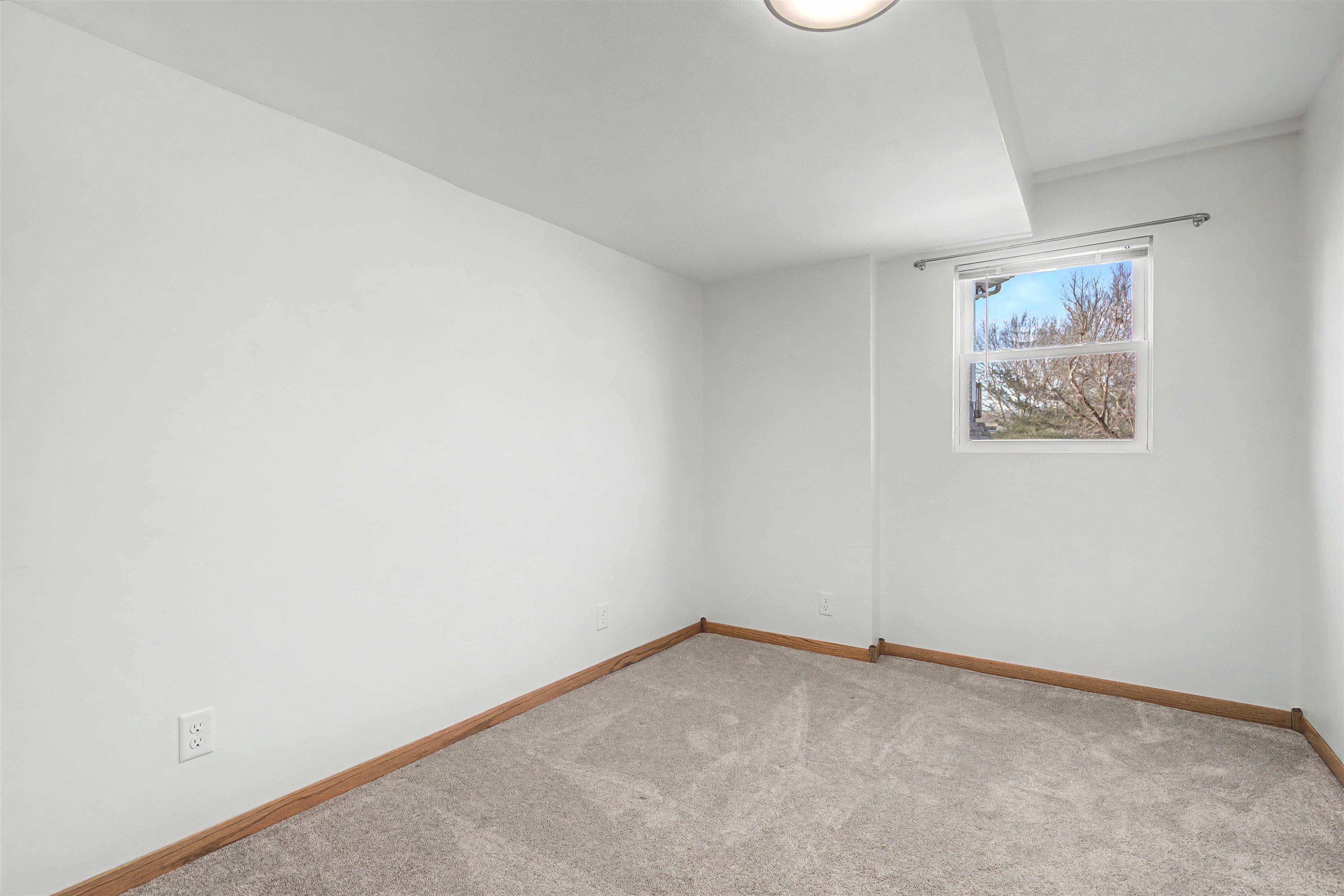 325 Apache Court Galena, IL 61036 - Photo 29 of 43 an empty room with a workbench