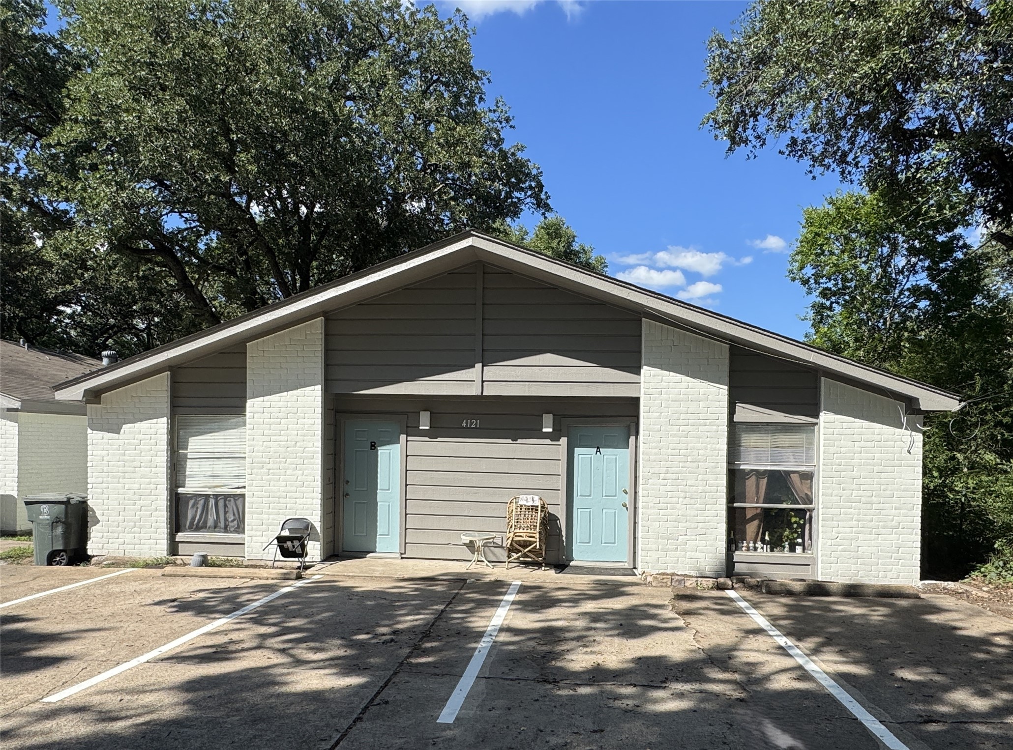 4121 Old Hearne Road Bryan, TX 77803 - Photo 1 of 14 a front view of a house with a garage