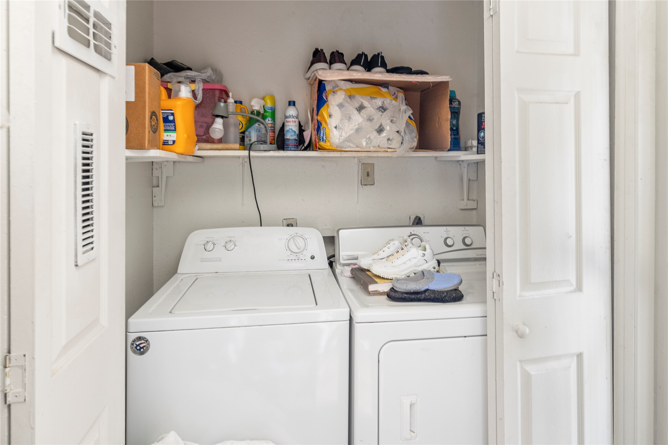 4121 Old Hearne Road Bryan, TX 77803 - Photo 8 of 14 a utility room with dryer and washer