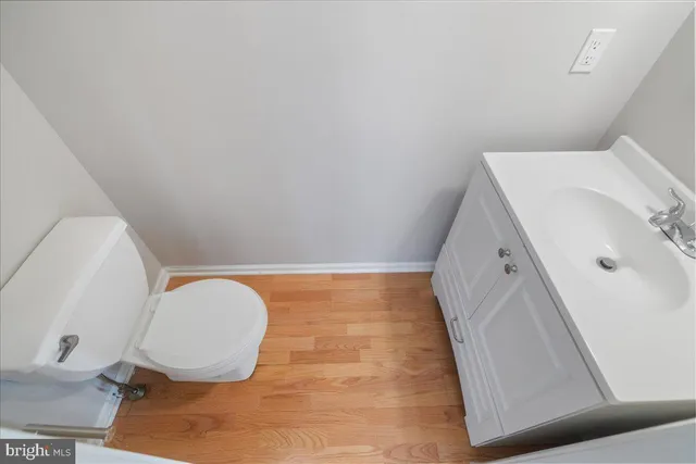 a view of an empty room with stairs