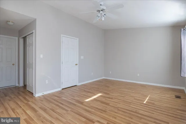 a view of outdoor space with swimming pool and green space