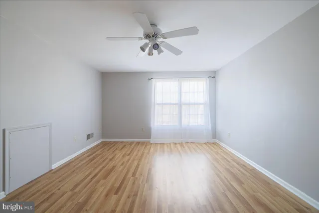 a large building with a clock on the side of it