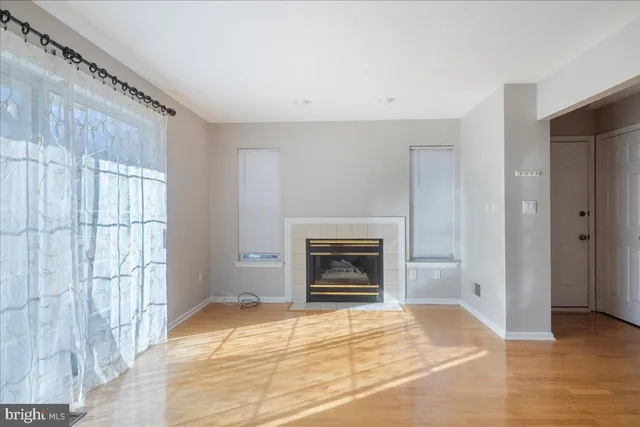 a bathroom with a double vanity sink toilet and shower
