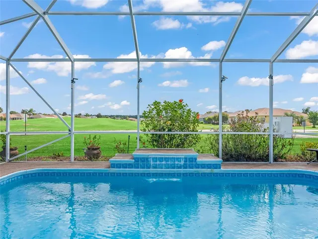 a view of yard with patio
