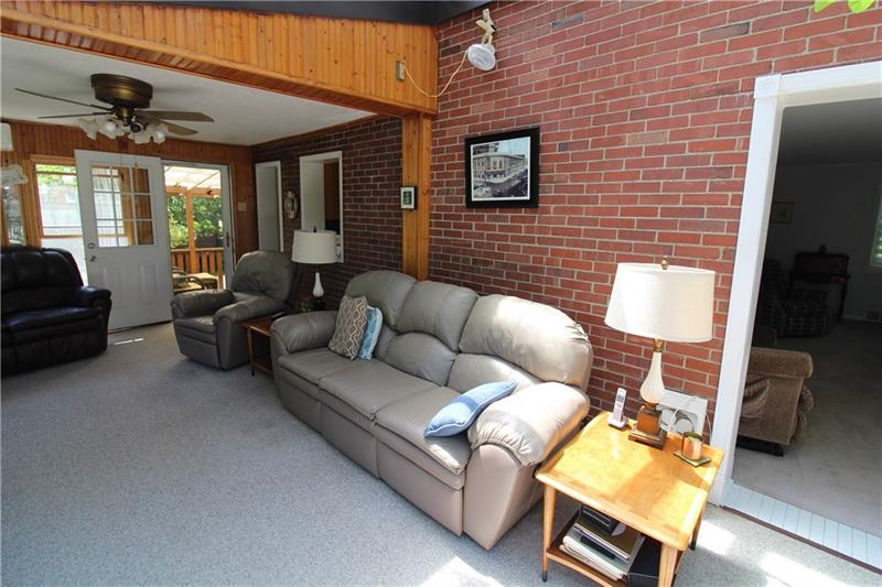 37 Forest Grove Road Coraopolis, PA 15108 - Photo 12 of 21 The light and bright solarium that has access to the living room, kitchen and back deck.