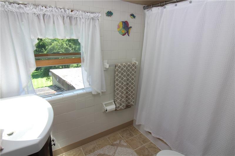 37 Forest Grove Road Coraopolis, PA 15108 - Photo 16 of 21 Full bath on the second floor with large window makes doing your makeup by natural light a breeze in the morning.