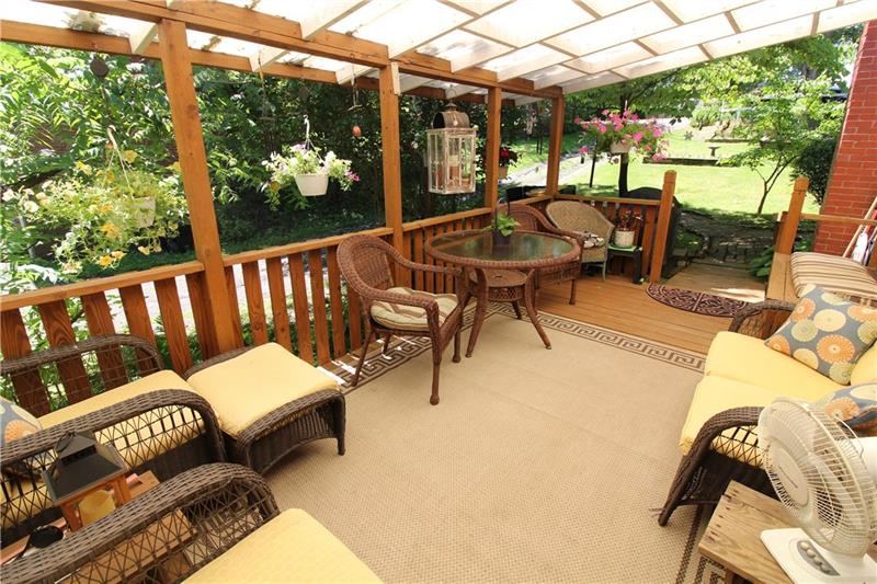 37 Forest Grove Road Coraopolis, PA 15108 - Photo 17 of 21 Stunning side porch will be an amazing space for the summer barbeques.
