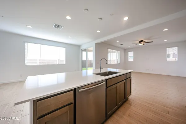 a kitchen with a sink and window