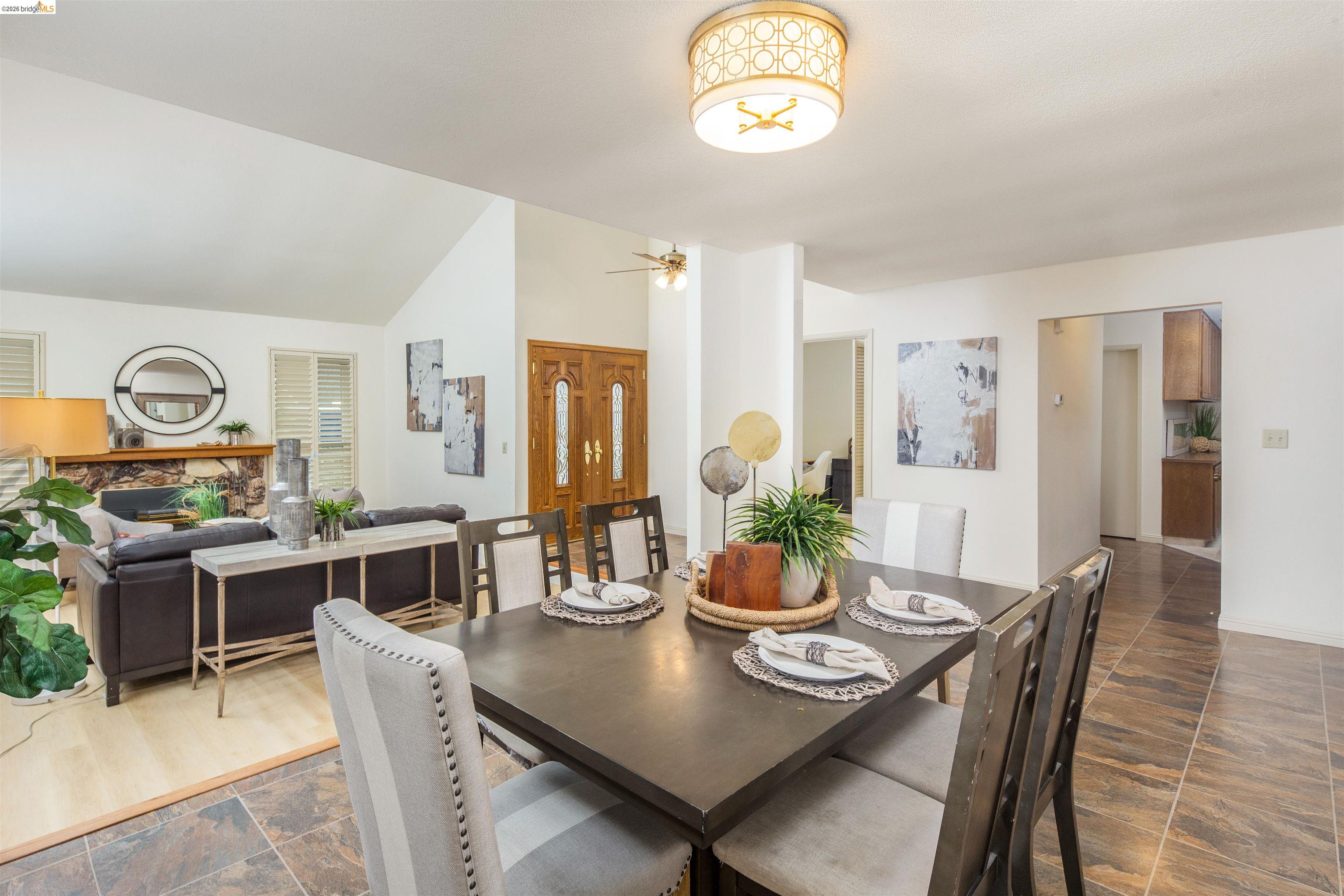 3237 Veracruz Drive San Ramon, CA 94583 - Photo 11 of 59 a view of a dining room with furniture window and wooden floor