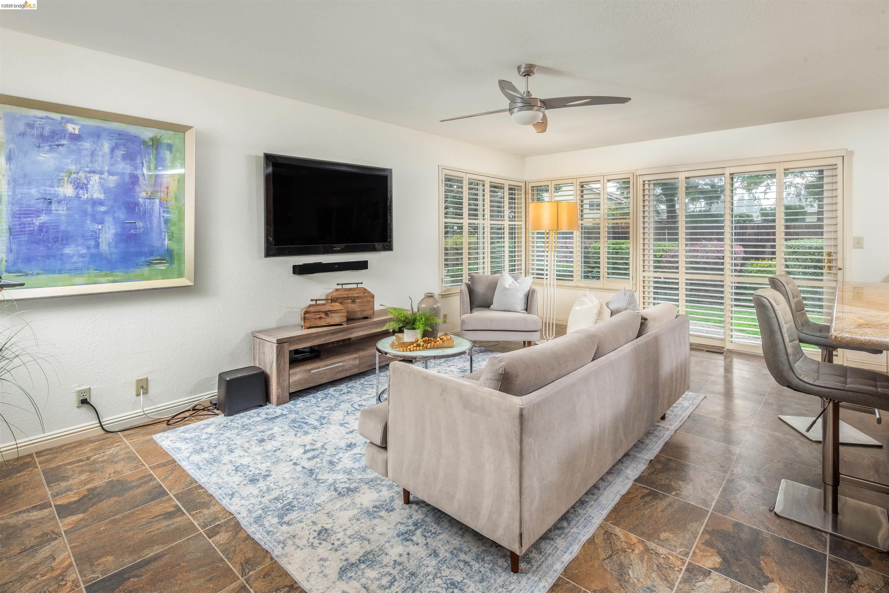 3237 Veracruz Drive San Ramon, CA 94583 - Photo 26 of 59 a living room with furniture and a flat screen tv