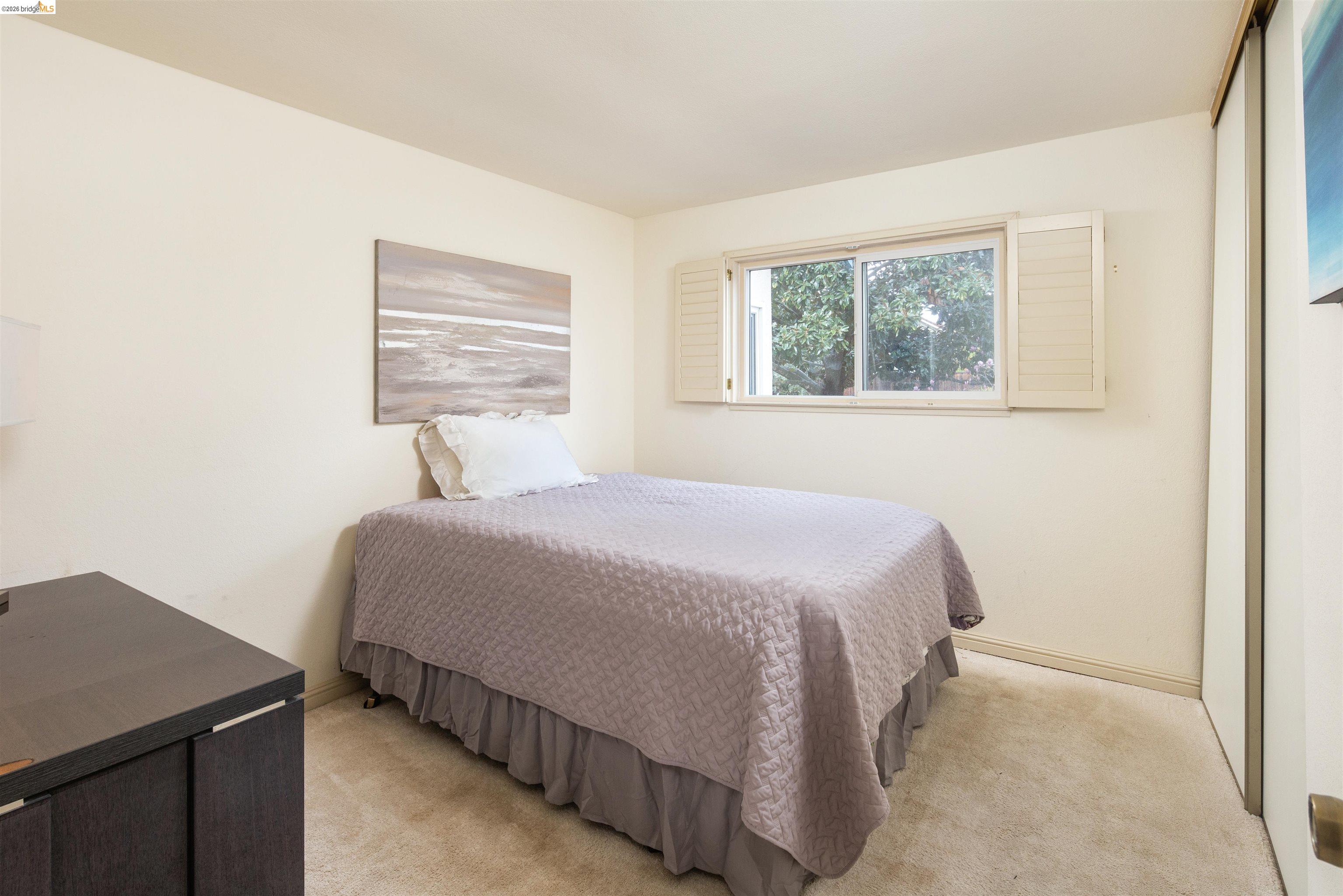 3237 Veracruz Drive San Ramon, CA 94583 - Photo 35 of 59 a bedroom with a bed and a window