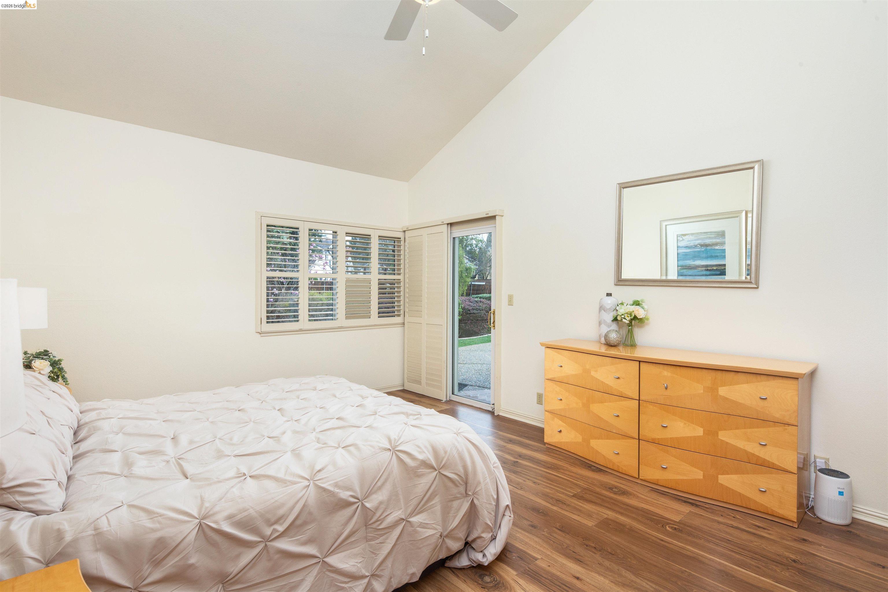 3237 Veracruz Drive San Ramon, CA 94583 - Photo 38 of 59 a bedroom with a large bed and a dresser